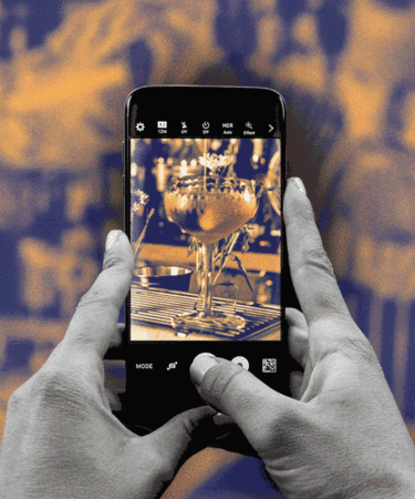 Ask Adam: Is It Rude to Take a Picture of the Bartender While They Make a Showy Drink?